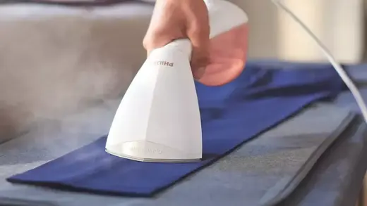 PHILIPS StyleTouch rokas tvaika gludināšanas ierīce Photo