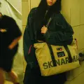 Skinarma Bag Fardel ivory Foto 5