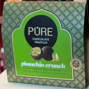 Piena šokolādes trifeles ar kraukšķīgu pistāciju krēma pildījumu 94g PURE