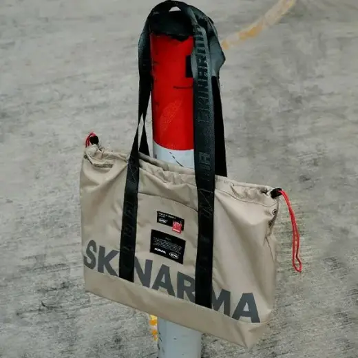 Skinarma Bag Fardel ivory Foto 7