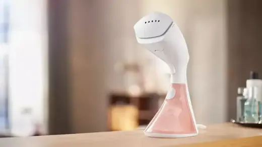PHILIPS StyleTouch rokas tvaika gludināšanas ierīce Photo