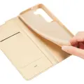 Dux Ducis Skin Pro Holster Cover Flip Cover for Samsung Galaxy S22 + (S22 Plus) gold Photo