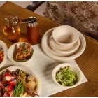 Compostable sugar cane plates Go Green Photo