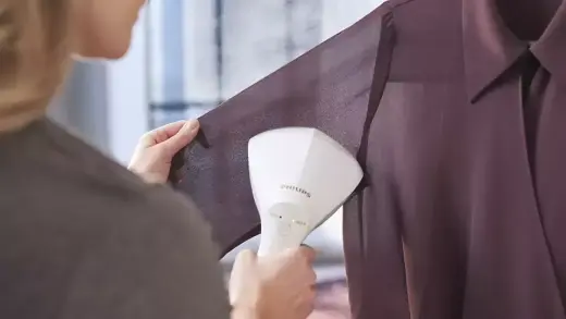 PHILIPS StyleTouch rokas tvaika gludināšanas ierīce Photo