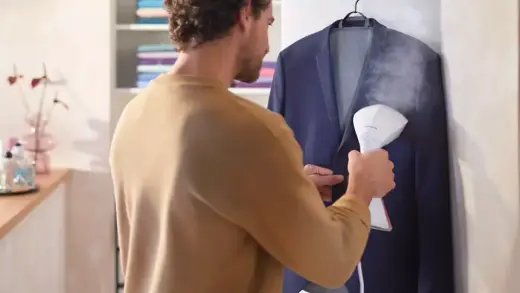 PHILIPS StyleTouch rokas tvaika gludināšanas ierīce Photo