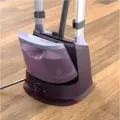 PHILIPS Tvaika gludeklis ar statīvu un iebūvētu StyleBoard, 2000W, violets Photo