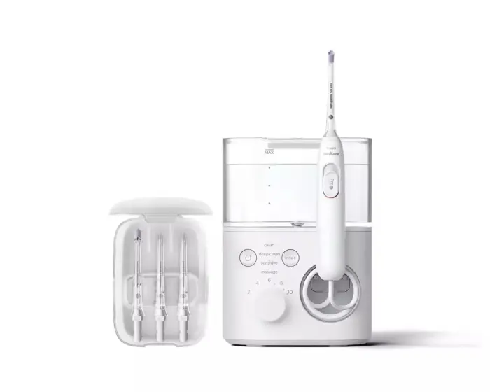 Sonicare mutes dobuma irrigators,  balts